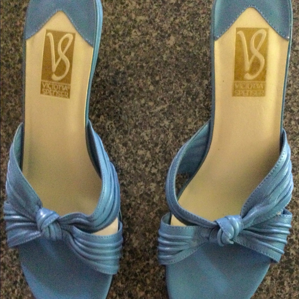 Lt. blue leather medium slip-on sandals.